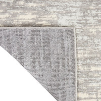 grey beige calvin klein rug corner fold on white background