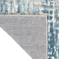 ivory seaglass calvin klein rug corner fold on white background