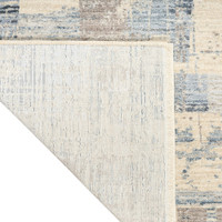 blue beige calvin klein rug corner fold on white background