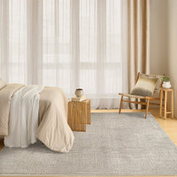 grey abstract rug in a room with matching decor