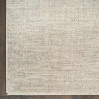 grey abstract rug closeup corner on wood floor