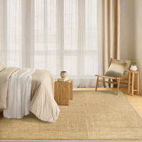 taupe abstract rug in a room with matching decor