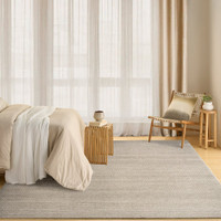 ivory grey rug in a room with matching decor