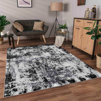 modern abstract acrylic black rug in a living room