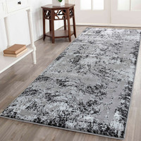 modern abstract acrylic black rug runner in a hallway