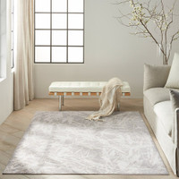 grey ivory calvin klein rug in a room with matching decor