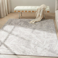 grey ivory calvin klein rug in a room with matching decor