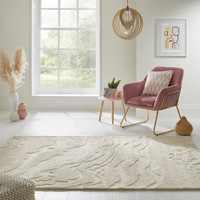 ivory abstract rug in a room with matching decor