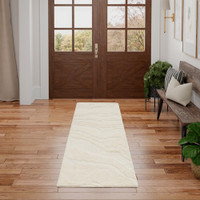 ivory abstract rug in a room with matching decor