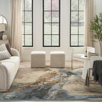 beige blue abstract rug in a room with matching decor