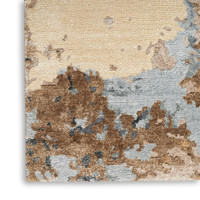 beige blue abstract rug closeup corner on white background