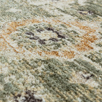 green traditional rug closeup detail