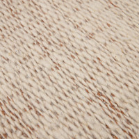 rust flatweave wool rug closeup detail