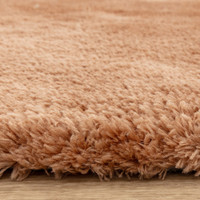 terracotta shaggy rug closeup border
