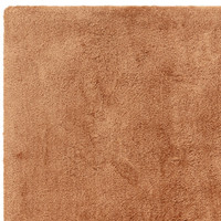 terracotta shaggy rug closeup corner