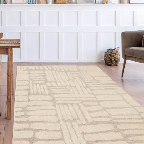 Ava Pave Cream Rug in a living room