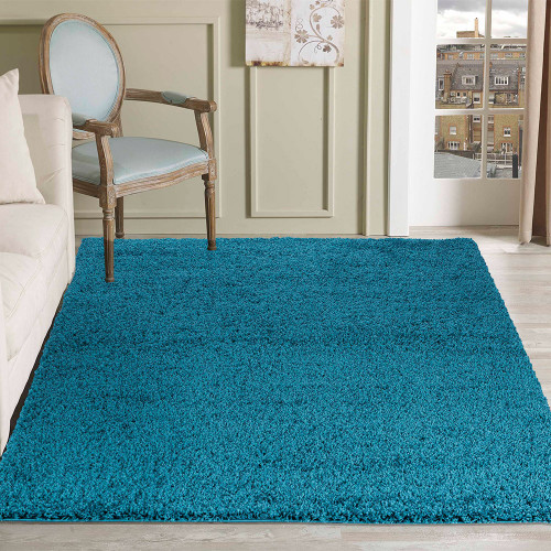 plain shaggy teal rug in a living room