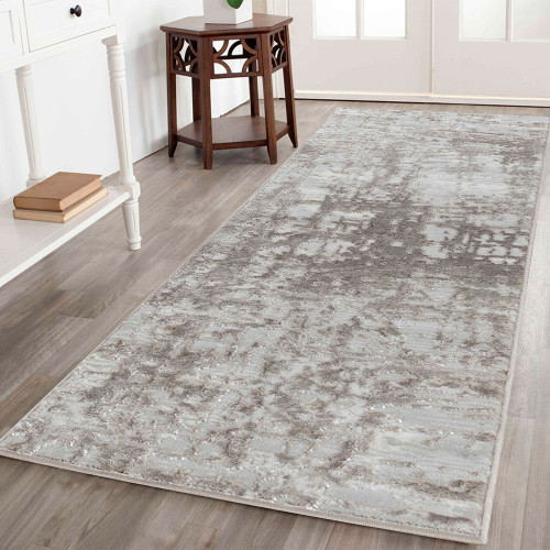 modern abstract lines stone rug runner in a hallway