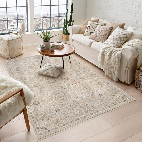 traditional floral beige rug in a living room