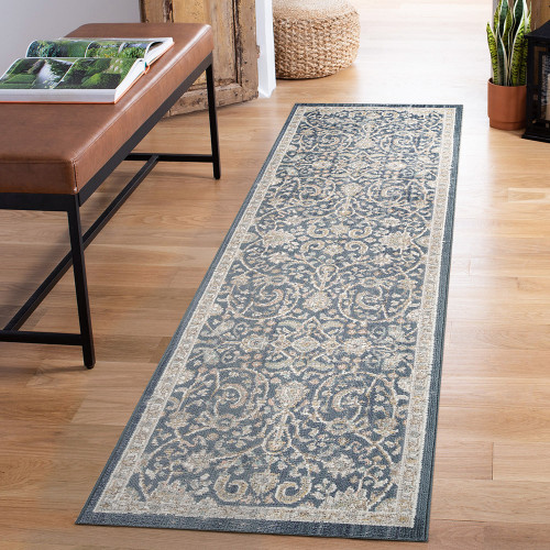 traditional floral navy rug runner in a hallway
