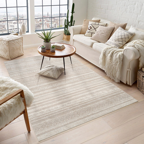 traditional beige rug in a living room