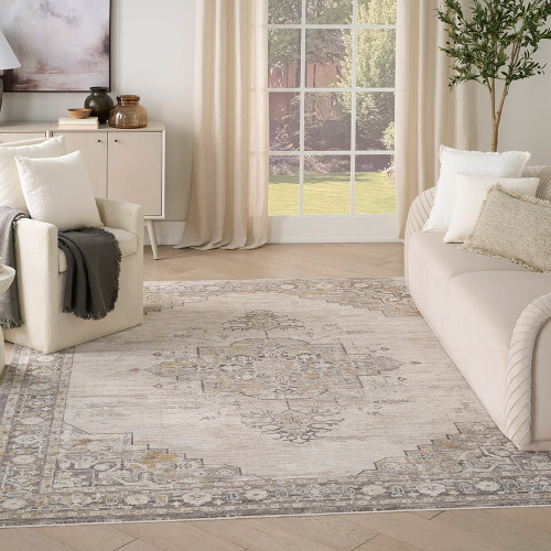 grey traditional rug in a living room with white decor