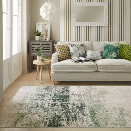 ivory olive abstract rug in a living room with matching decor