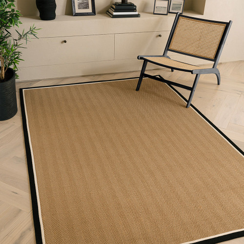 charcoal cream jute rug in a living room with matching decor