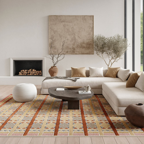 rust blue geometric rug in a living room