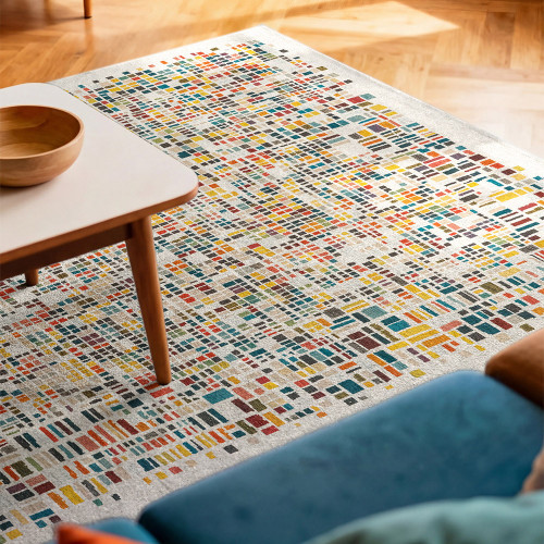 multicolour abstract rug in a bedroom with matching decor