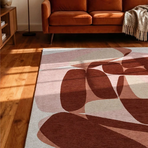cherry mocha abstract rug in a bedroom with matching decor