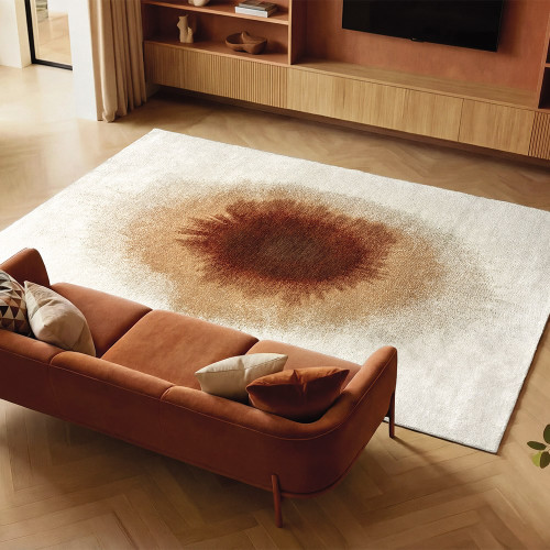 brown abstract rug in a living room with matching decor