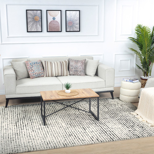 ivory black scandi rug in a room with matching decor