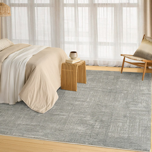 slate abstract rug in a room with matching decor