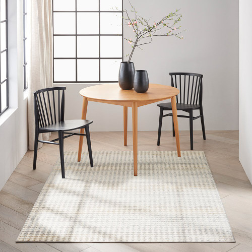 ivory multi calvin klein rug in a room with matching decor
