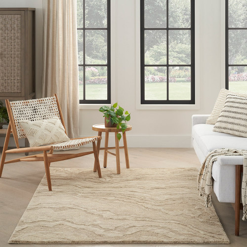 taupe abstract rug in a room with matching decor