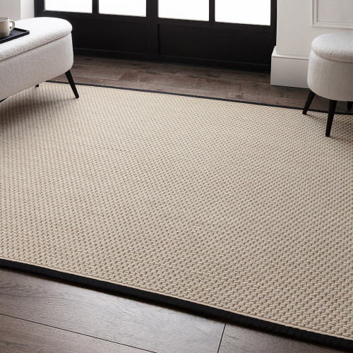 cream wool jute rug in a living room with matching decor