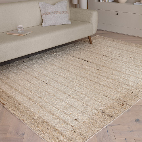 beige wool rug rug in a living room with matching dec