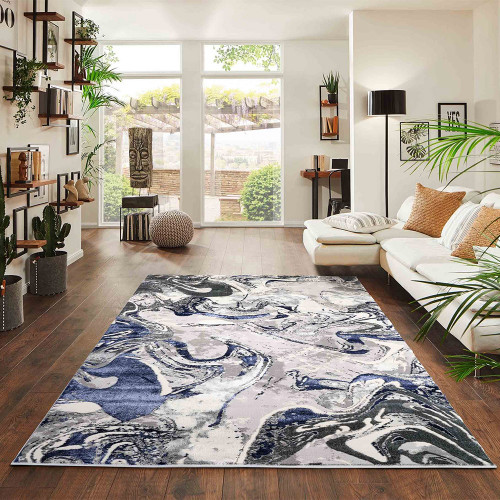 navy grey abstract rug in a living room