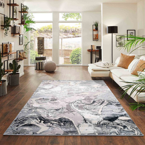 silver abstract rug in a living room