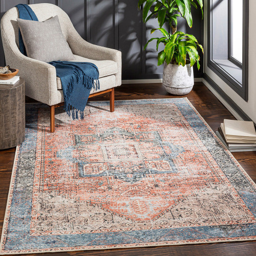 rust traditional rug in a room with matching decor