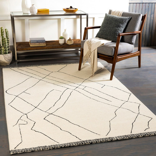 cream wool rug in a room with matching decor