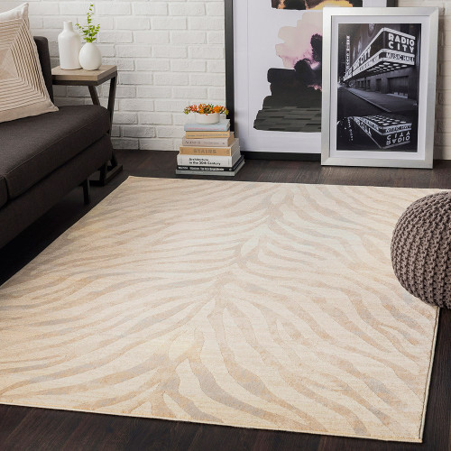 grey zebra pattern rug in a room with matching decor