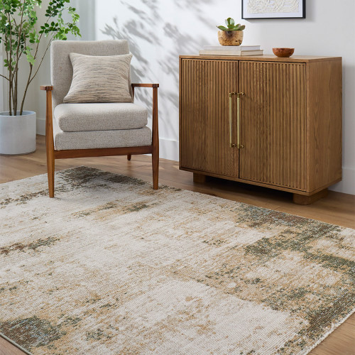 cream abstract rug in a room with matching decor