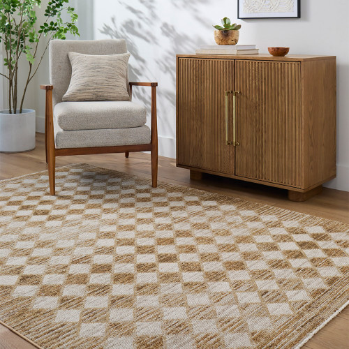 mustard geometric rug in a room with matching decor