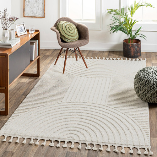 ivory berber geometric rug in a room with matching decor