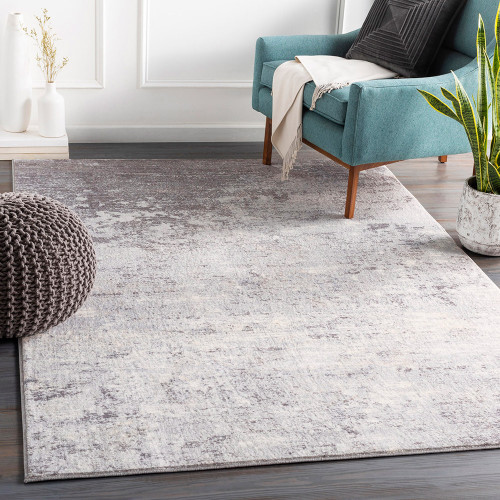 silver abstract rug in a room with matching decor