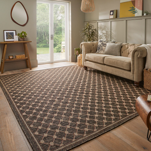 brown rug in a living room with matching decor