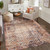 lattice multi-colour rug in a living room on hard wood floor