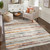 stripe multi-colour rug in a living room on hard wood floor
